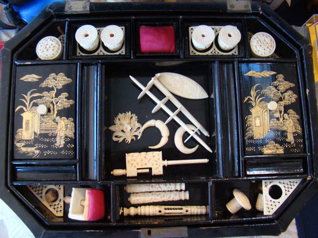 A fine large 19th century Chinese black and gold lacquer sewing box loaded with the original period accessories — image 2